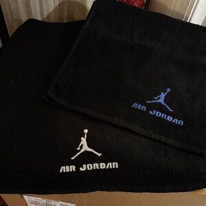 Jordan Black Towels with Blue and White Logo